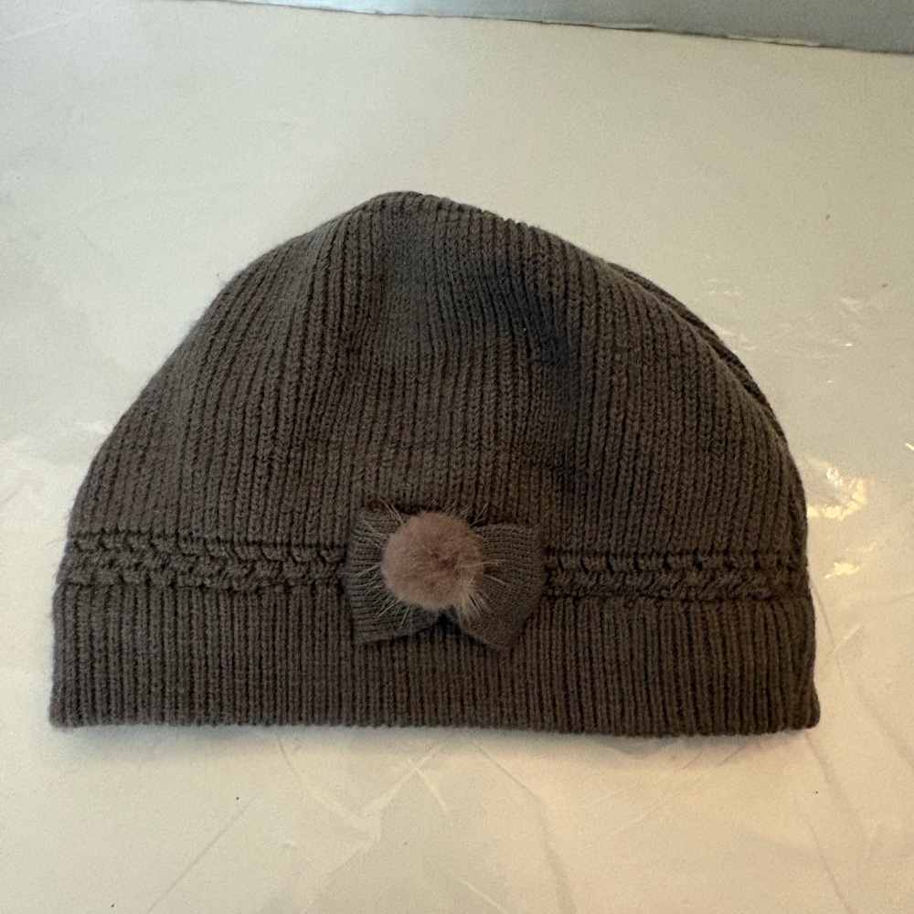 Cozy Brown Knit Beanie for winter with fur accent
